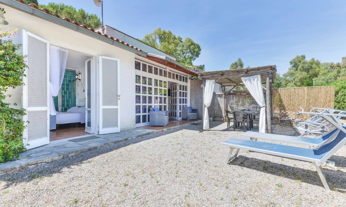 Lacona Apartamento | Moderno apartamento vacacional con jardín, aire acondicionado y Wi-Fi