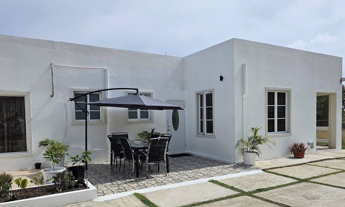Oistins Casa | Modern 2 bedroom apartment.. 10 minute walking distance from the beach.