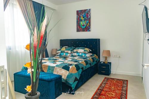 Dzorwulu Apartamento | Modern 2 Bedroom Apartment at Airport - 24 7 Security, Pool, Gym, Rooftop, Free Parking, Free Airport Pickup for Long Stay,Opposite Kozo Restaurant