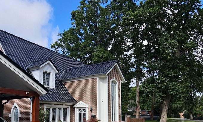 Midlum Apartamento | Modern and cozy vacation apartment on the North Sea, rural, quiet, with garden