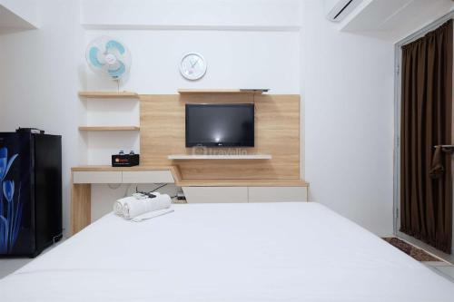 Gunung Putri Apartamento | Modern and Homey Studio at Gunung Putri Apartment By Travelio