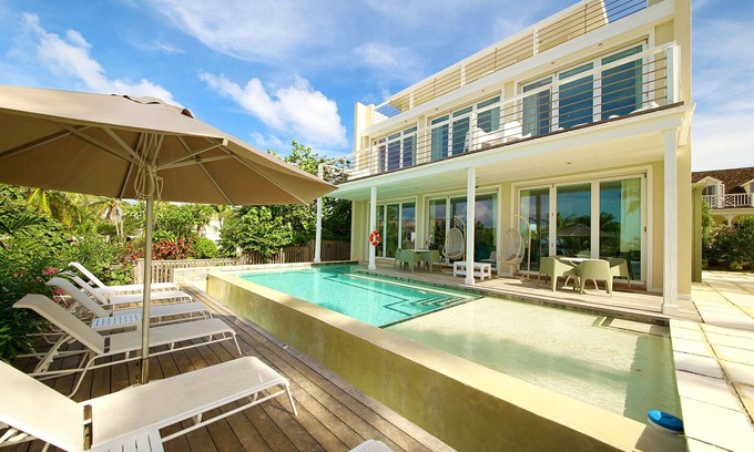 Governor's Harbour Casa | Modern and spacious villa with private pool with ocean sunset view