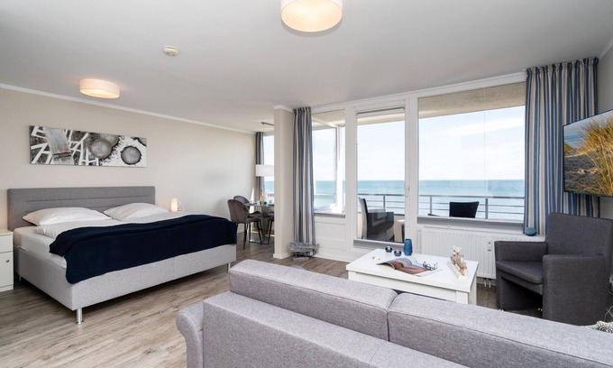 List Apartamento | Modern app. with balcony, sea view, parking space, WLAN. Pets allowed.