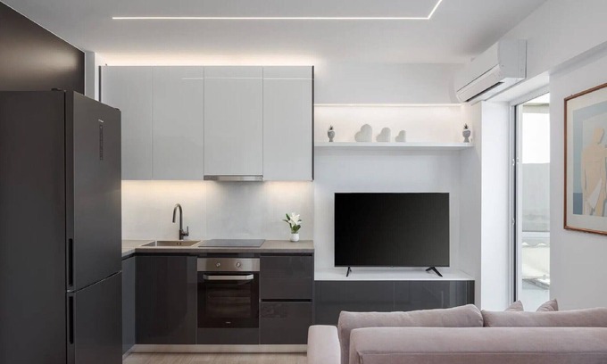 Vouliagmeni Villa | Modern Athens Apartment | Apartment Luxe | 1 Bedroom | Balcony with Garden Views | Private Hot Tub | 200 m to Sea | Vouliagmeni