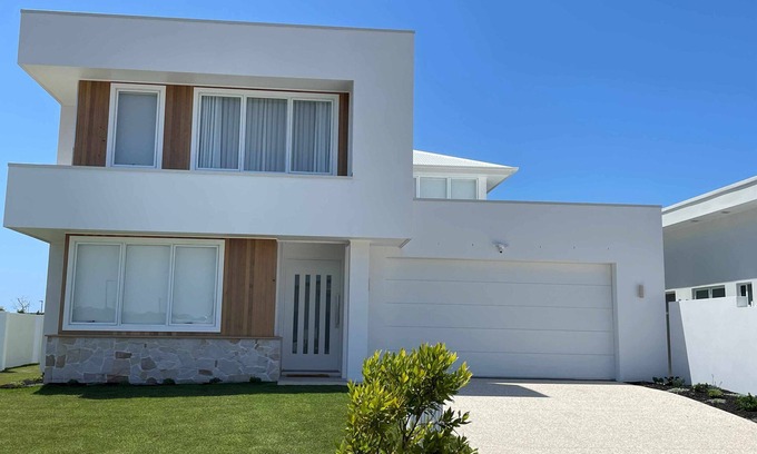Pelican Waters Casa | Modern Boho Retreat with Pool, Yard & Beaches Just Minutes Away