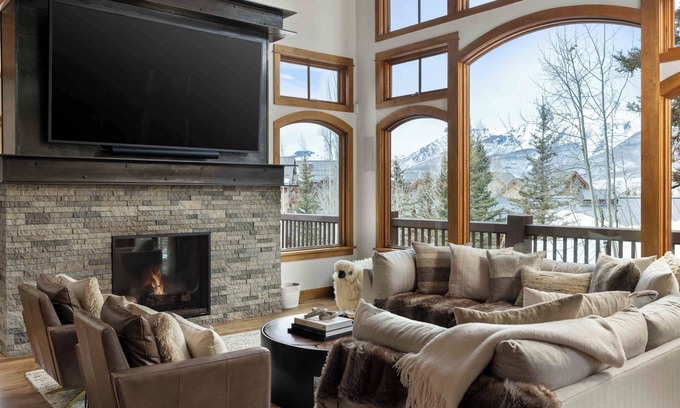 Mountain Village Cabina | Modern Cabin by InvitedHome | Vast Patio, Fireplaces, Hot Tub, Steps to Ski