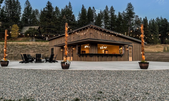 Clancy Cabina | Modern cabin on 10 creek front acres with large gas fire pit.