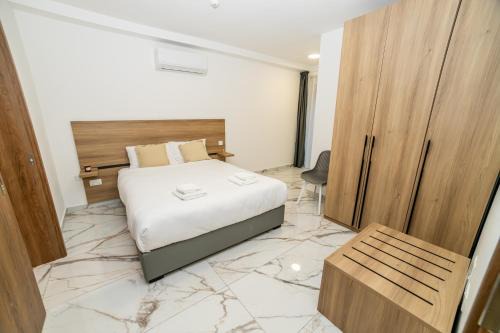 Bugibba Apartamento | Modern Escape 3-Bedroom Maisonette with Free Parking