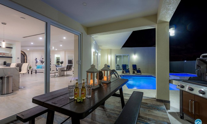 Noord Villa | Villa Elegante - privacidad, piscina, AC- Wifi - Alarm - Grill - Sillas de Playa