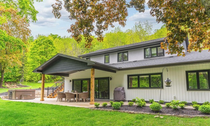 Georgian Bluffs Casa | Modern Green Oasis in private setting, covered patio with hot tub and fire pit!
