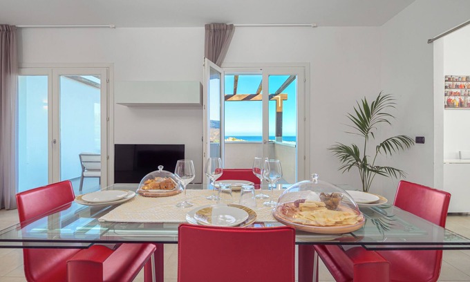 Golfo Aranci Apartamento | Moderno apartamento vacacional 7 en Villa Marconi con vistas al mar y solarium privado