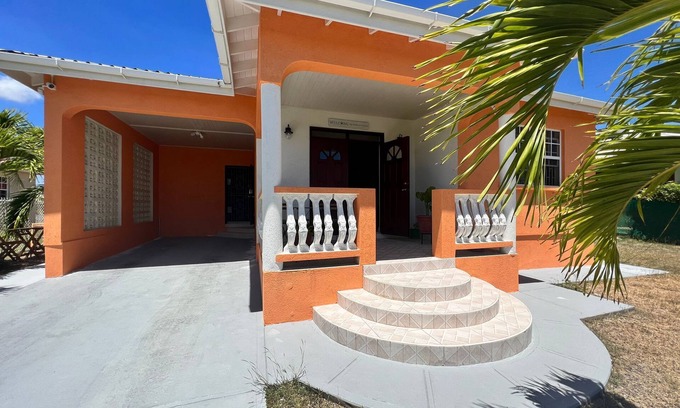 Oistins Casa | Modern Home Close to Beach, Oistins, Surfing. Secondary Rental on Premises.