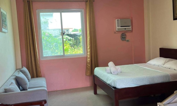 Bacnotan Apartamento | Modern, Long Stay Studio Suite in a beachfront resort.
