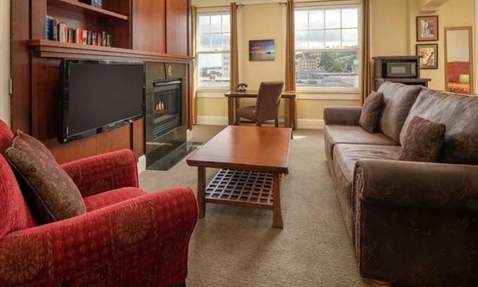 Astoria Hotel | Modern Meets Victorian: Room w/ Handcrafted Cabinetry & Heated Tile Floors