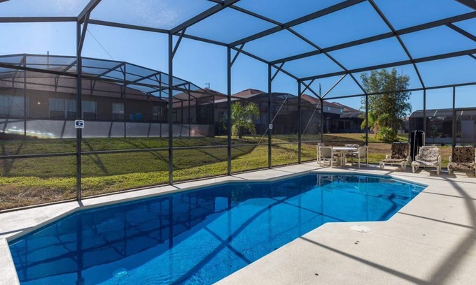 Windwood Bay Casa | Moderna casa de piscina con sala de juegos, 2 en suites y solo 15 minutos de parques temáticos.