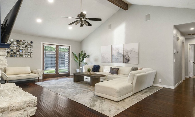 South Tulsa Casa | Modern space in south Tulsa w/ outdoor firepit, kitchen, turf, & string lights!