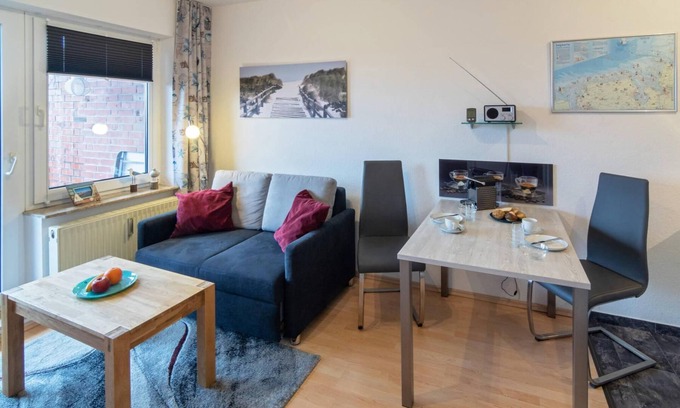 Dornum Apartamento | Modern upper apartment Asgard with a view of the canal