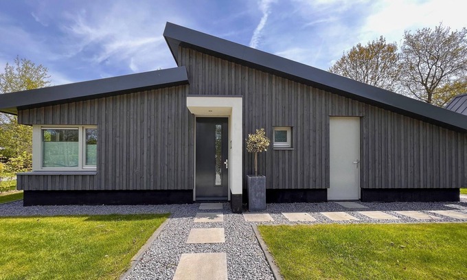Dirkshorn Casa | Villa moderna con terraza y jardín en Dirkshorn