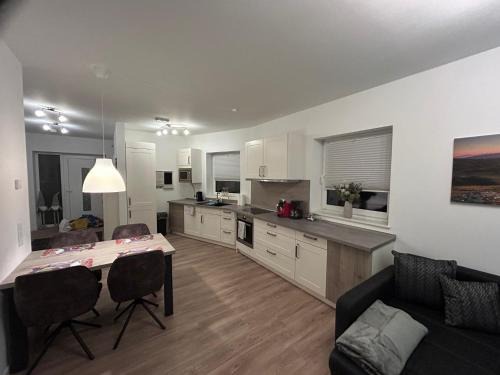 Schiffdorferdamm Apartamento | Moderne Ferienwohnung Green Garden mit Garten und Stellplatz