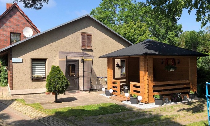 Wiek Casa | cabaña modernizada en Wiek Rügen tranquila con pabellón cubierto