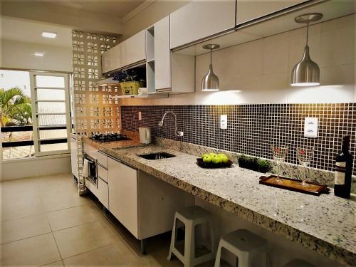 Ipiranga Apartamento | Moderno e confortável apto Prainha Caraguatatuba