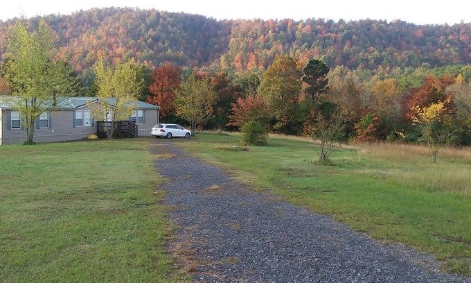 Board Camp Casa | Modest 3-bedroom house near Wolf Pen Gap and the Ouachita National Forest.