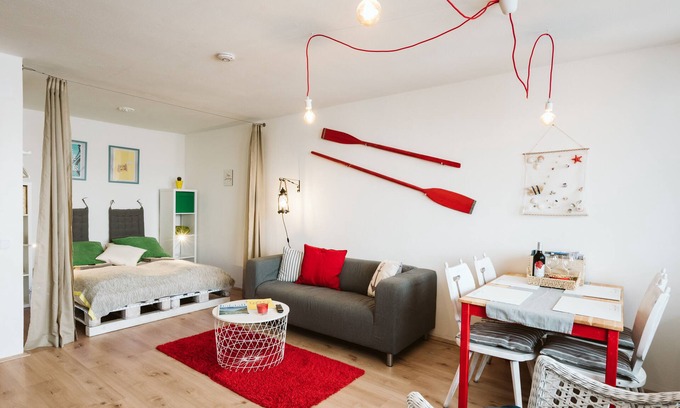 Bodensdorf Apartamento | MOOKI Apartamento de playa con playa propia.