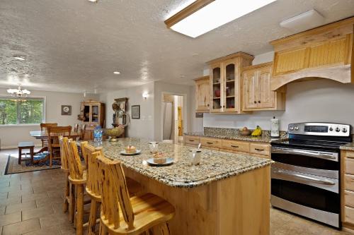 Island Park Casa | Moose Drool by KABINO 5 acres Fire Pit Pool Table Ping Pong Foosball WiFi Grill Mtn Trails