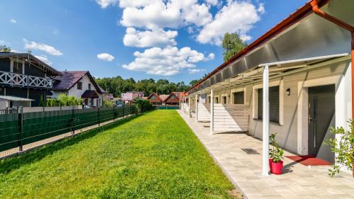 Sztutowo Cabina | Morskie Domki Apartamentowe by PIAMOLA