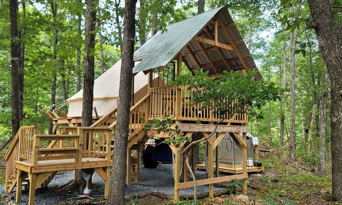 Denton Casa | Mountain Bell tent Tree house providing views of surrounding mountains and lake.