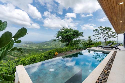 Rio Seco Casa | Mountainside Home with Modern Design Sweeping Ocean Views & Private Swimming Pool