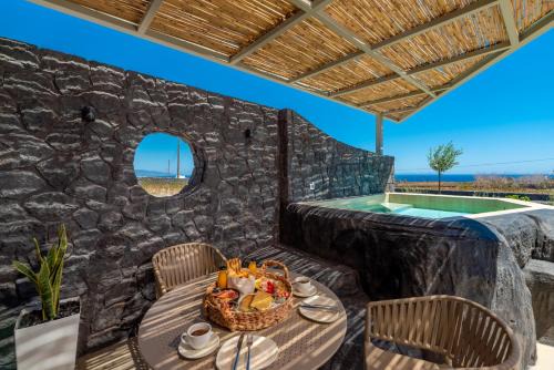 Kamari Cama Y Desayuno | Mperes Villas