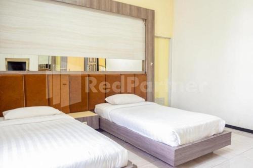 Surabaya Hotel | My Hommy Homestay Mitra RedDoorz