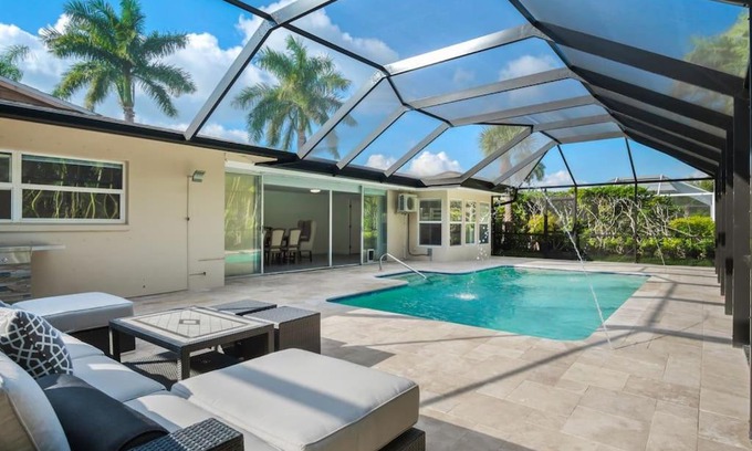 Palm River Estates Casa | Naples Dream Escape 4BRHome heated pool 10minBeach