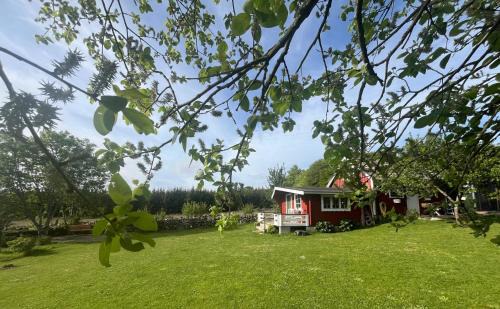 Arkelstorp Cabina | Naturnära Fritidsboende, Tomtebo - YinTorp