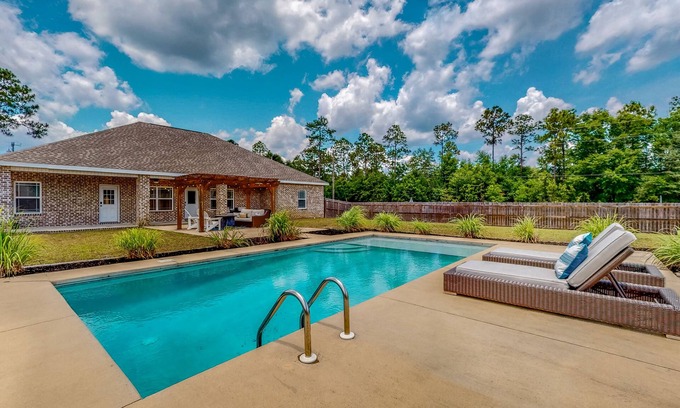 Crestview Casa | Nautical-themed retreat with a saltwater pool, fire table, full kitchen, and AC