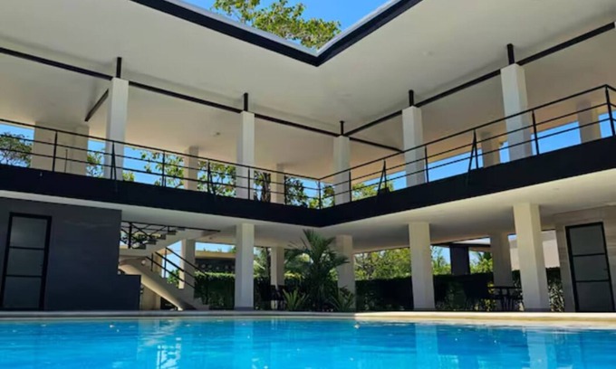 Tambor Apartamento | New 2 Br + Patio Condo, steps to private beach