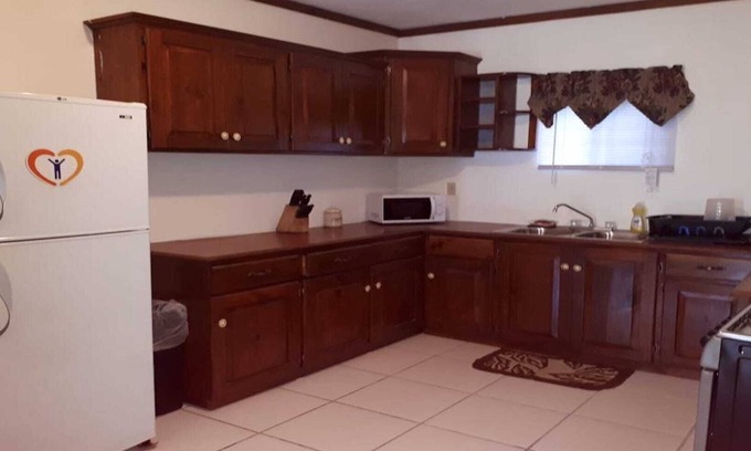 Sandy Bay Apartamento | NUEVO y asequible fantástico apartamento de 2 dormitorios a pasos de la playa en Sandy Bay