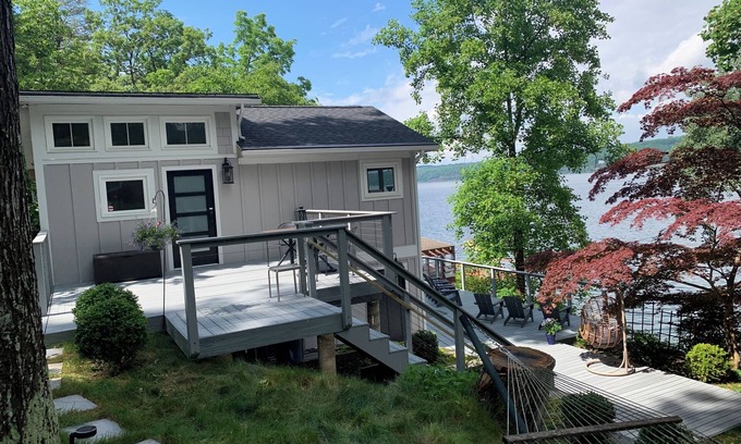 Northwest Ithaca Cabaña | New cottage, close to Ithaca, hot tub, fireplace, waterfront, dock, sleeps 5