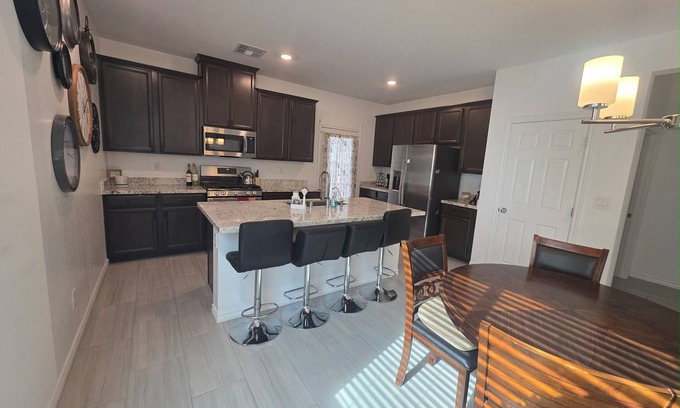 North Las Vegas Casa | New Gated Luxury: Modern gated 2 bed 2 bath home with soaking Tub, Patio, BBQ.