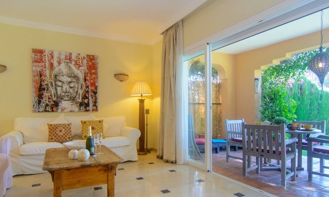 Nueva Milla de Oro Cabaña | Casa adosada frente al mar New Golden Mile con jardín y barbacoa