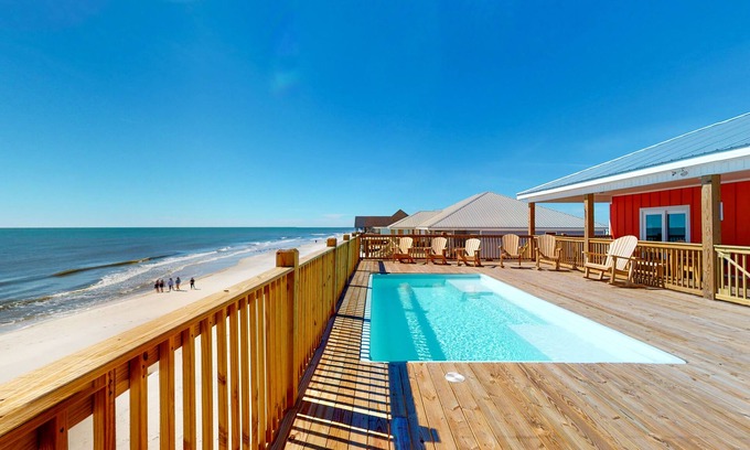 Dauphin Island Casa | New Gulf front home with vast deck, heated saltwater pool & views - dog-friendly