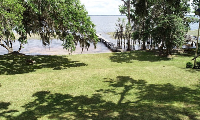 Waldo Casa | Alquiler de casa nueva! ¡6 acres en el lago Santa Fe, 4BR 3BA, 192 pies de frente de lago!