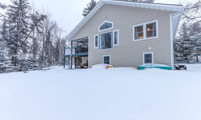 Arbor Vitae Casa | New Lake Home w Water Toys & Game Rm! In Town & On Snowmobile Trails