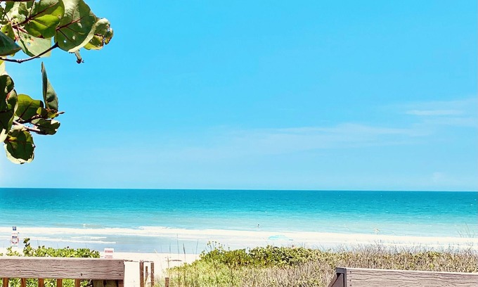 Melbourne Beach Casa | New Luxury Coastal Classic w/Hanging Bed-Steps to Beach. Designer Showcase home.