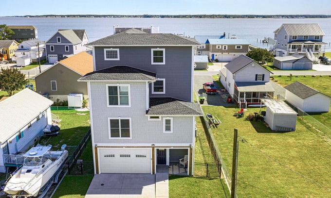 Long Neck Casa | New rental! This 3-level home has water views to die for! Just 30 min to Lewes and Rehoboth Beach!