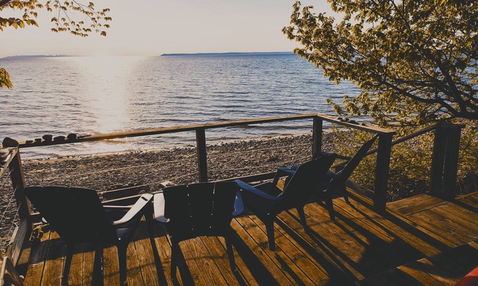 Lake Leelanau Cabaña | NEW! Waterfront Cottage on private Lake Michigan Beach with glorious sunsets