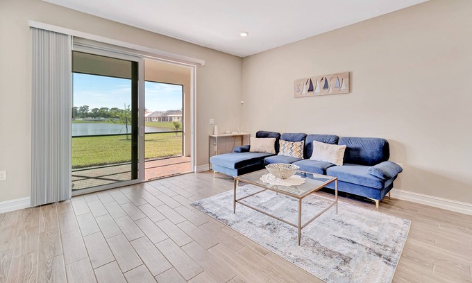 Venice Casa | Newly built, single-story home on a lagoon with a porch, pool and bocce courts