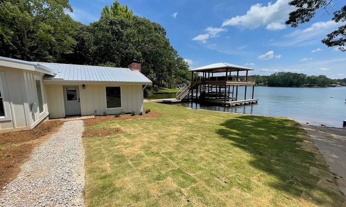 Dadeville Cabina | Newly renovated lakefront cabin at Lake Martin! Dock and boat ramp onsite!!