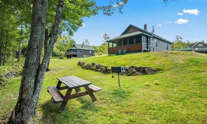 Rangeley Plantation Casa | Bonita comunidad de cabañas con playa de arena compartida con plataforma de nado, muelles y amarres